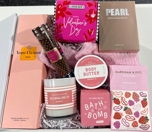 Valentine's Day Gift box filled with bath products, cookies, artisan chocolates and fuzzy socks.