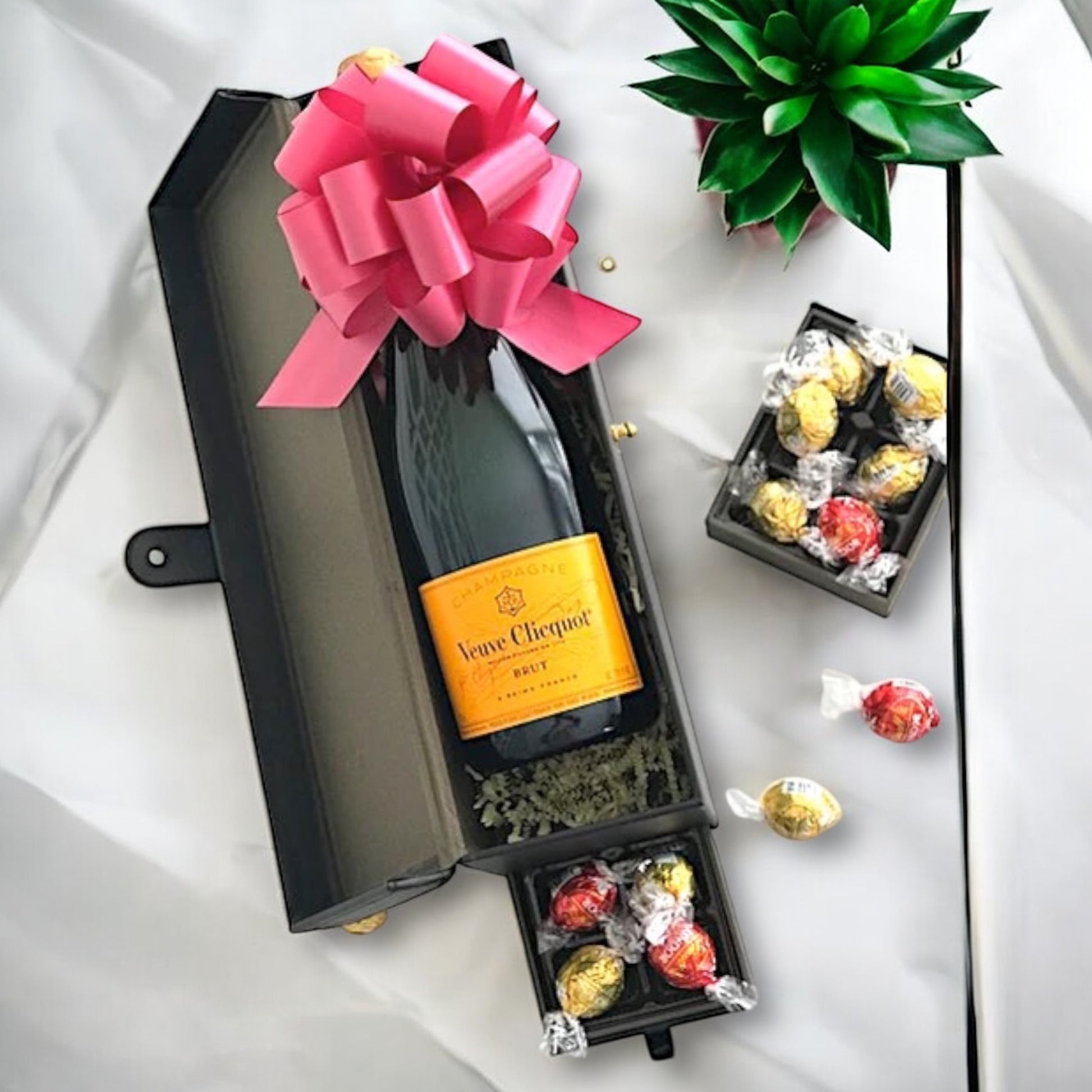 Leather gift box containing Veuve Clicquot Champagne and 6pc Lindt truffles