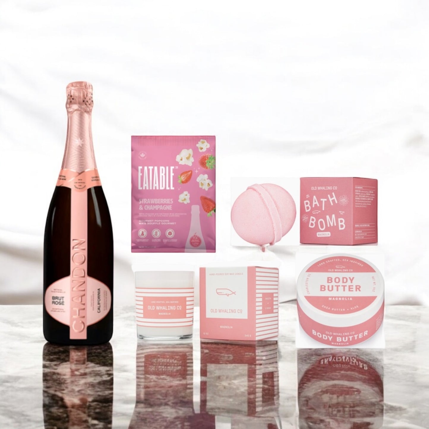 Sparkling rose wine with bath products and popcorn. Ships nationwide from NY.