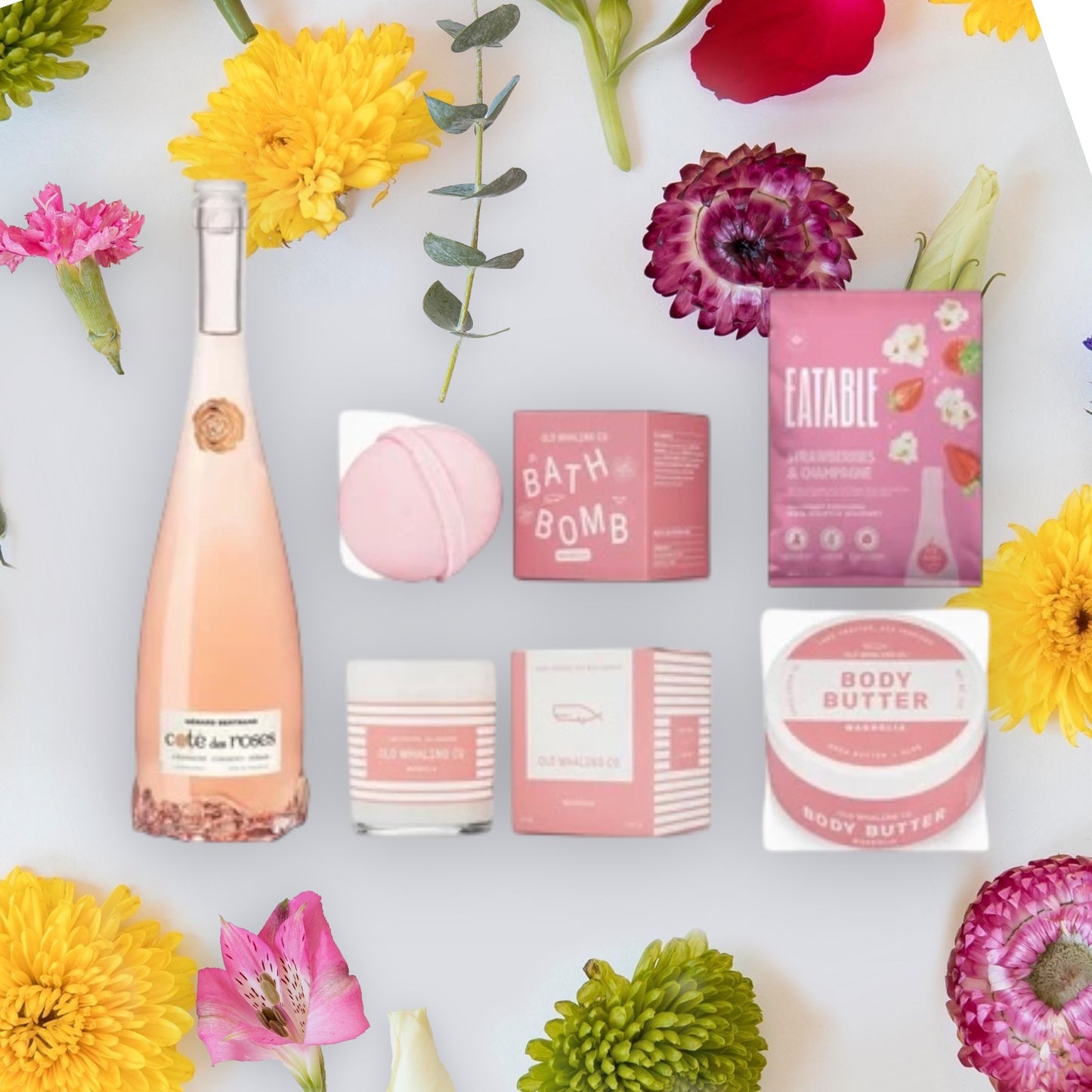 Gift box containing Cote de Roses, bath products and popcorn.