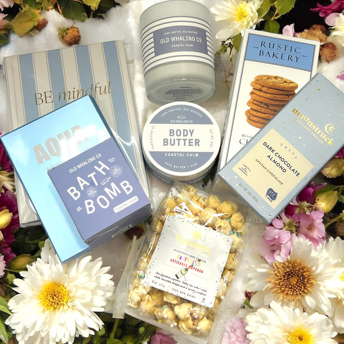 Relaxation Gift Basket filled with artisan chocolate, bath products, Be Mindful Journal, popcorn and chocolate chip cookies. Ships nationwide fro m NYC.