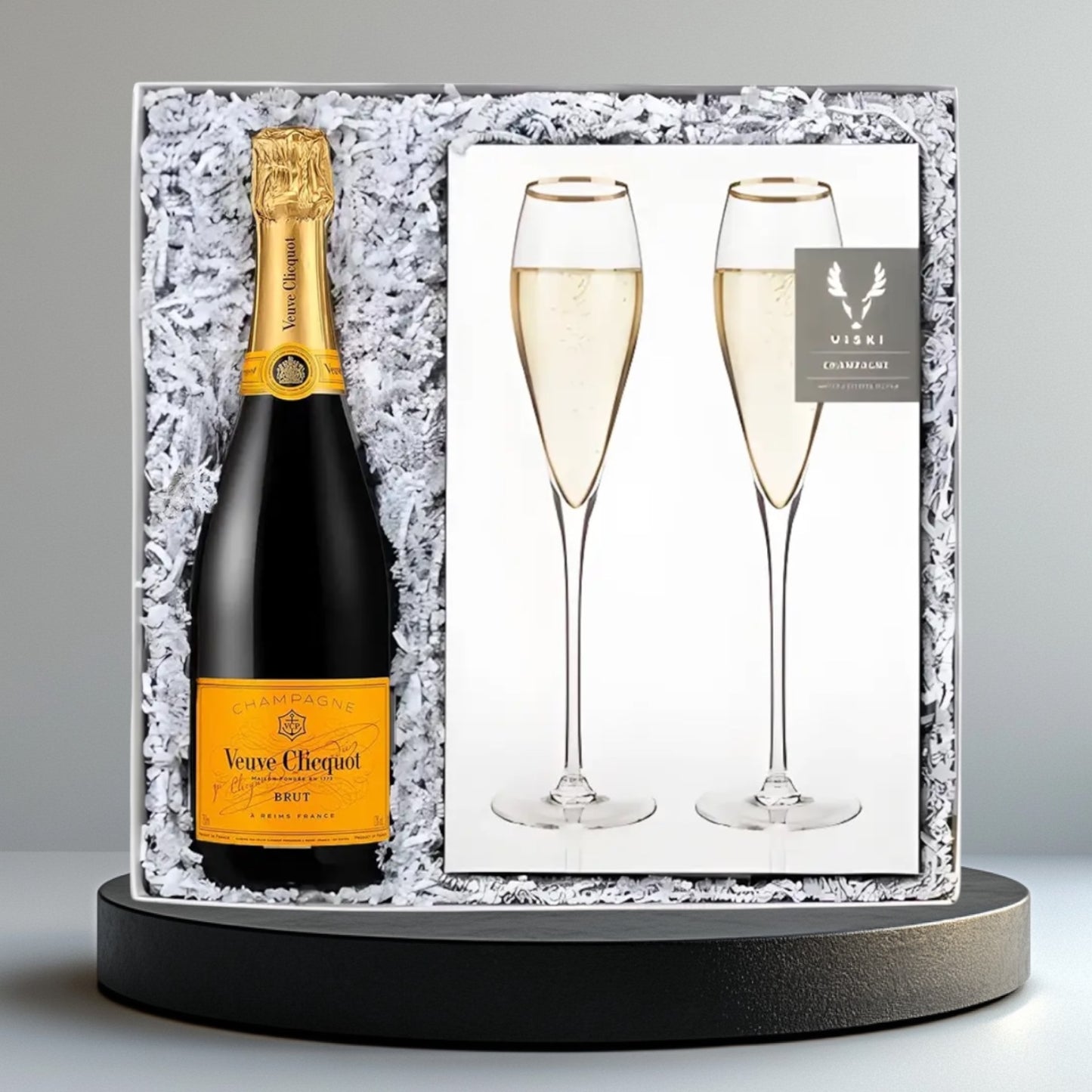 Veuve Clicquot Champagne and Flutes curated in a beauitful gift box. Ships nationwide from NY