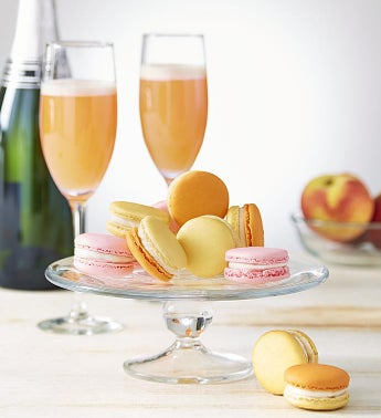 Gift box contains 12pc champagne macarons and a bottle of full size champagne.