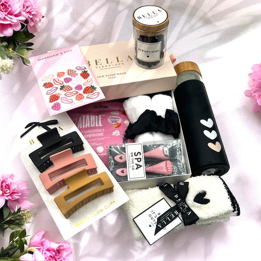 Spa gift basket filled with hair clips, scrunchies, water bottle, artisan chocolate, face mask, cozy socks and more. Ships nationwide from NY.
