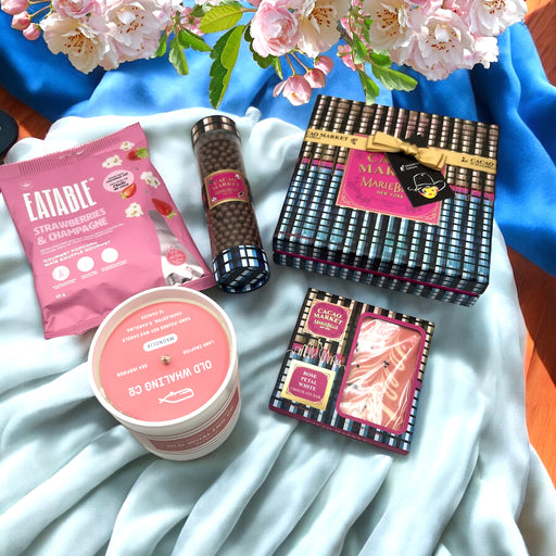 Mother's Day Gift Basket filled with popcorn, artisan chocolates, jellies and Magnolia scented candle. Ships nationwide from NYC.
