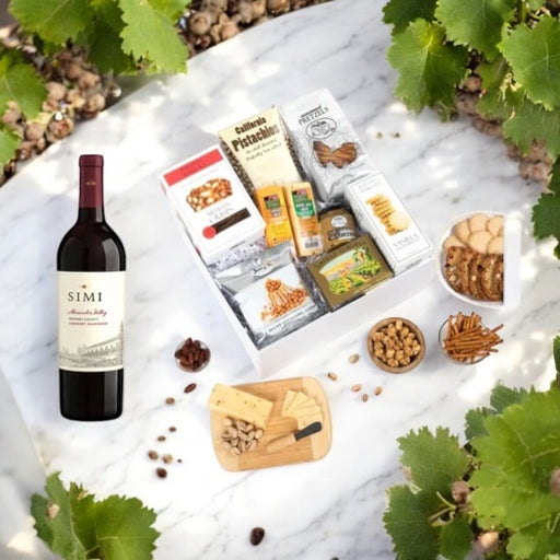 Gift box containing Simi Alexander Cabernet Sauvignon, assorted cheese, crackers, nuts, pretzels and cookies.