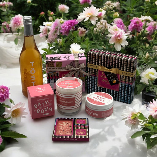 Alcohol-free rosé tost champagne artisan chocolates, gourmet jellies, and magnolia-inspired spa products from NYC, beautifully packaged and shipped nationwide. 