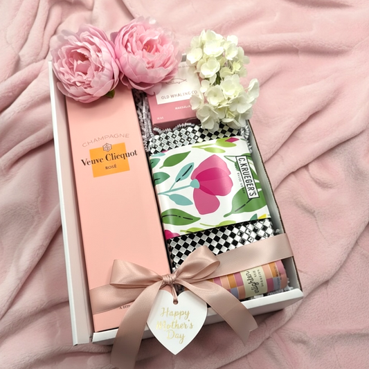 Veuve Clicquot Rose w/spring cookie tin, magnolia candle and whimsical matches.