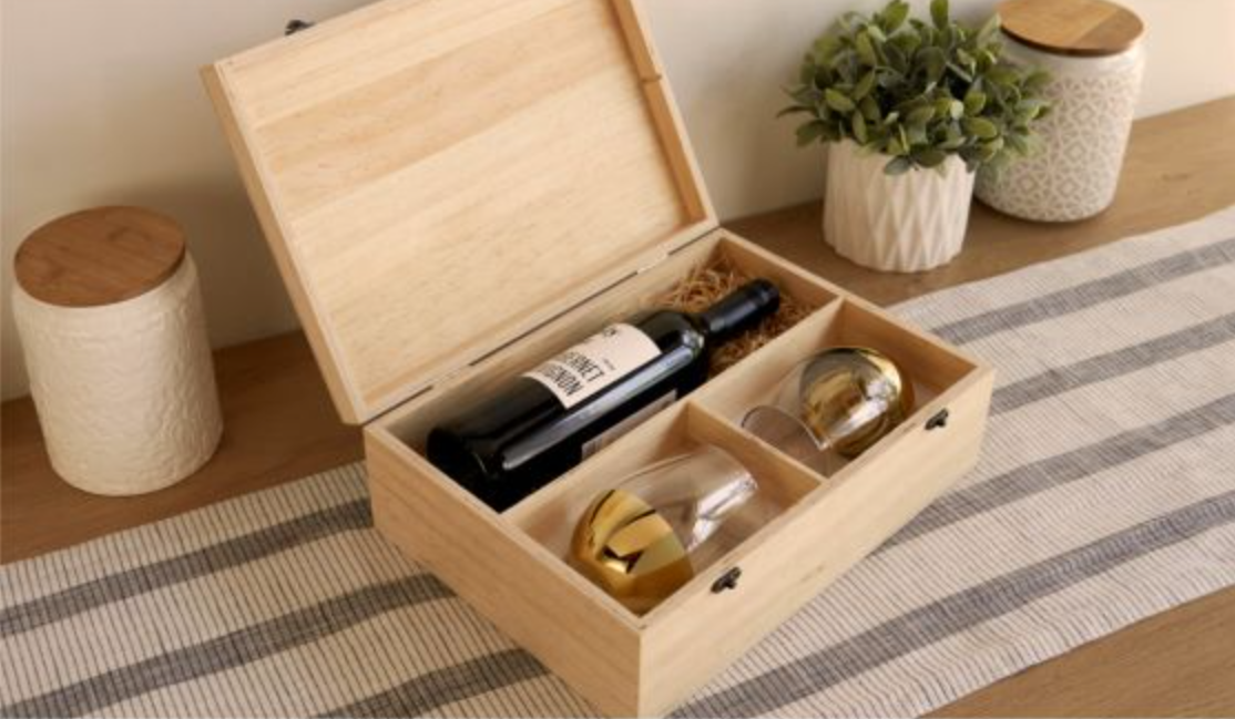 Wood crate containing wine and glasses.
