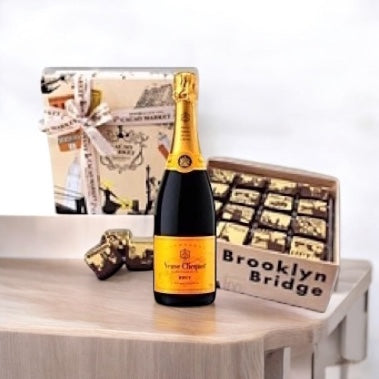 Gift box contains Veuve Clicquot Champagne with 16pc NYC inspired truffles