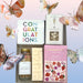 Congrats box filled with artisan chocolate bar, bride candle & matches, champagne candies and congrats cookies.