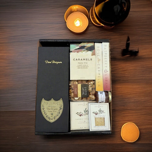 Dom Perignon w/artisan chocolates, cheese, crackers, popcorn & jam