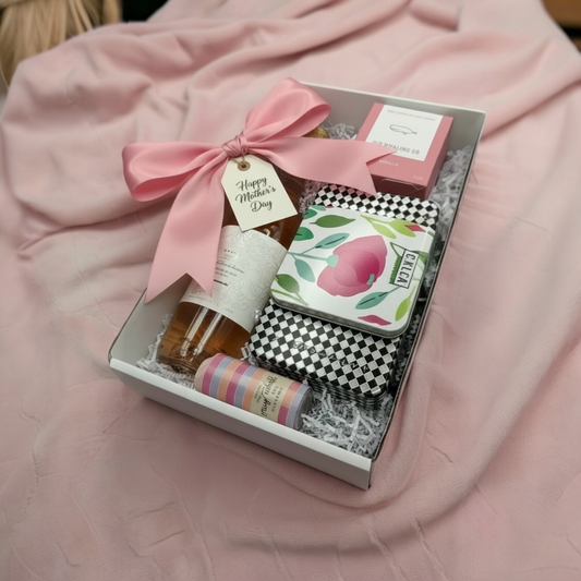 Whispering angel rose with magnolia candle, whimsical matches and cookie tin.
