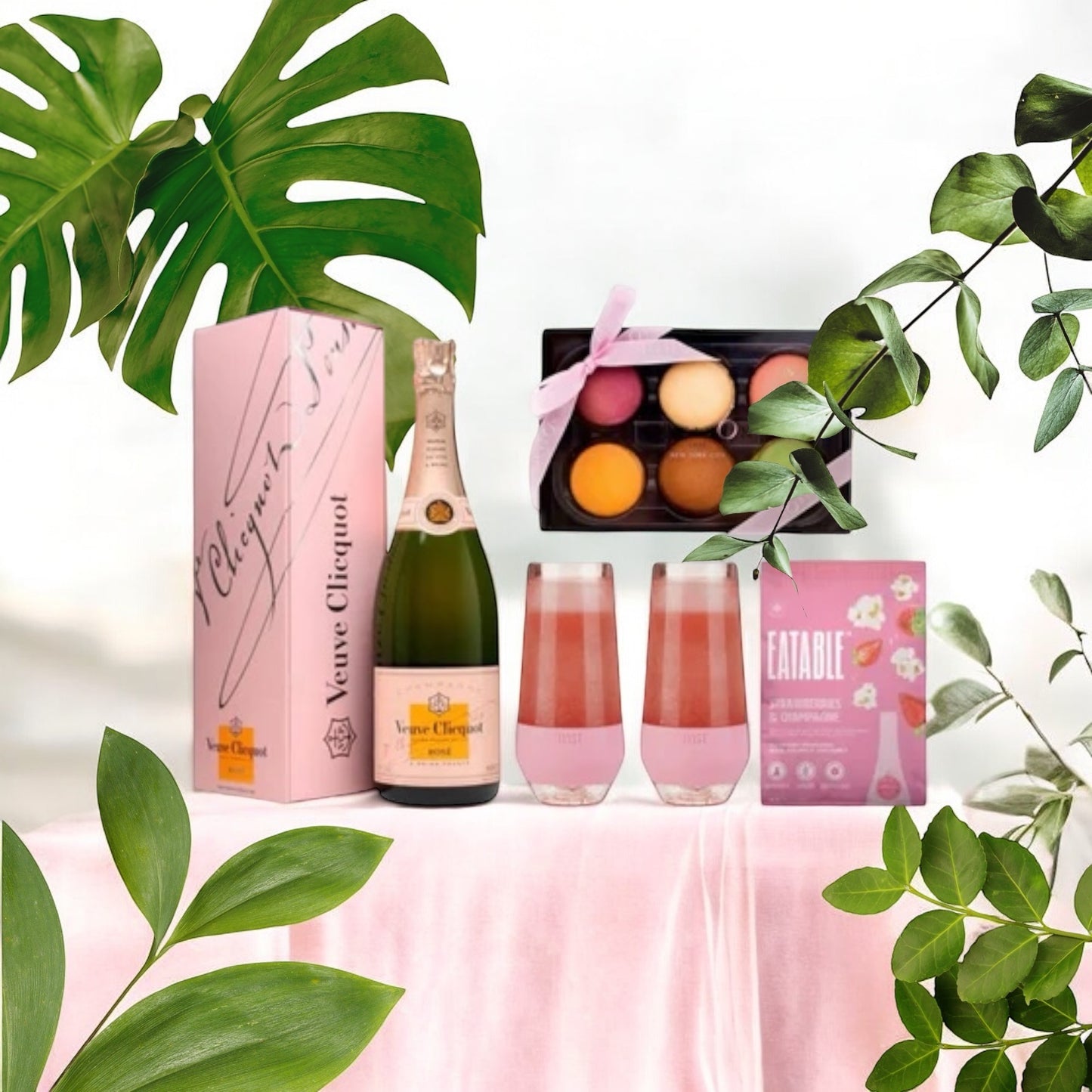 Gift  box containing Veuve Cliquot Rose 750m, 6 pastel macarons, popcorn and 2 cooling cups.