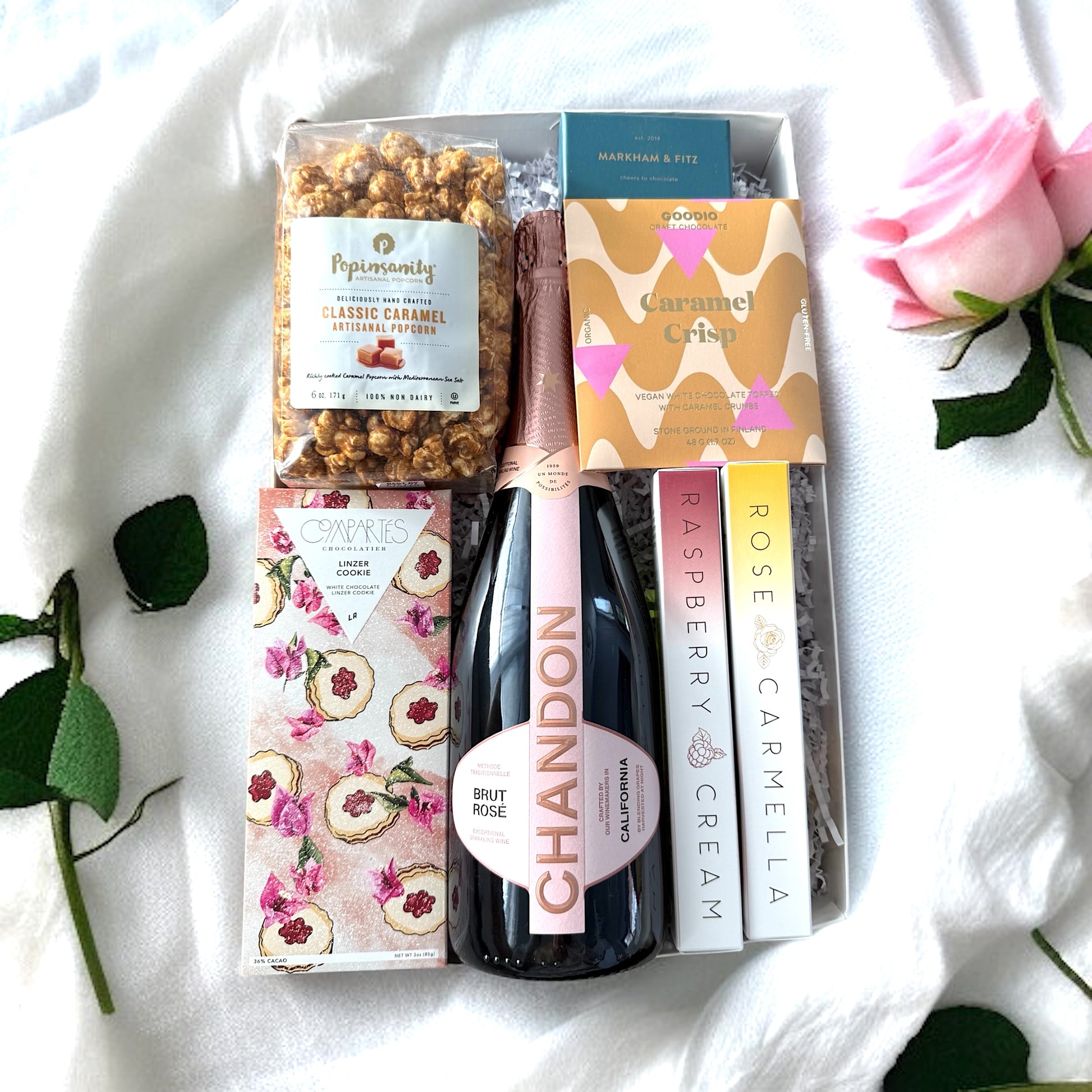 Rose luxury gift basket with gourmet treats and premium items