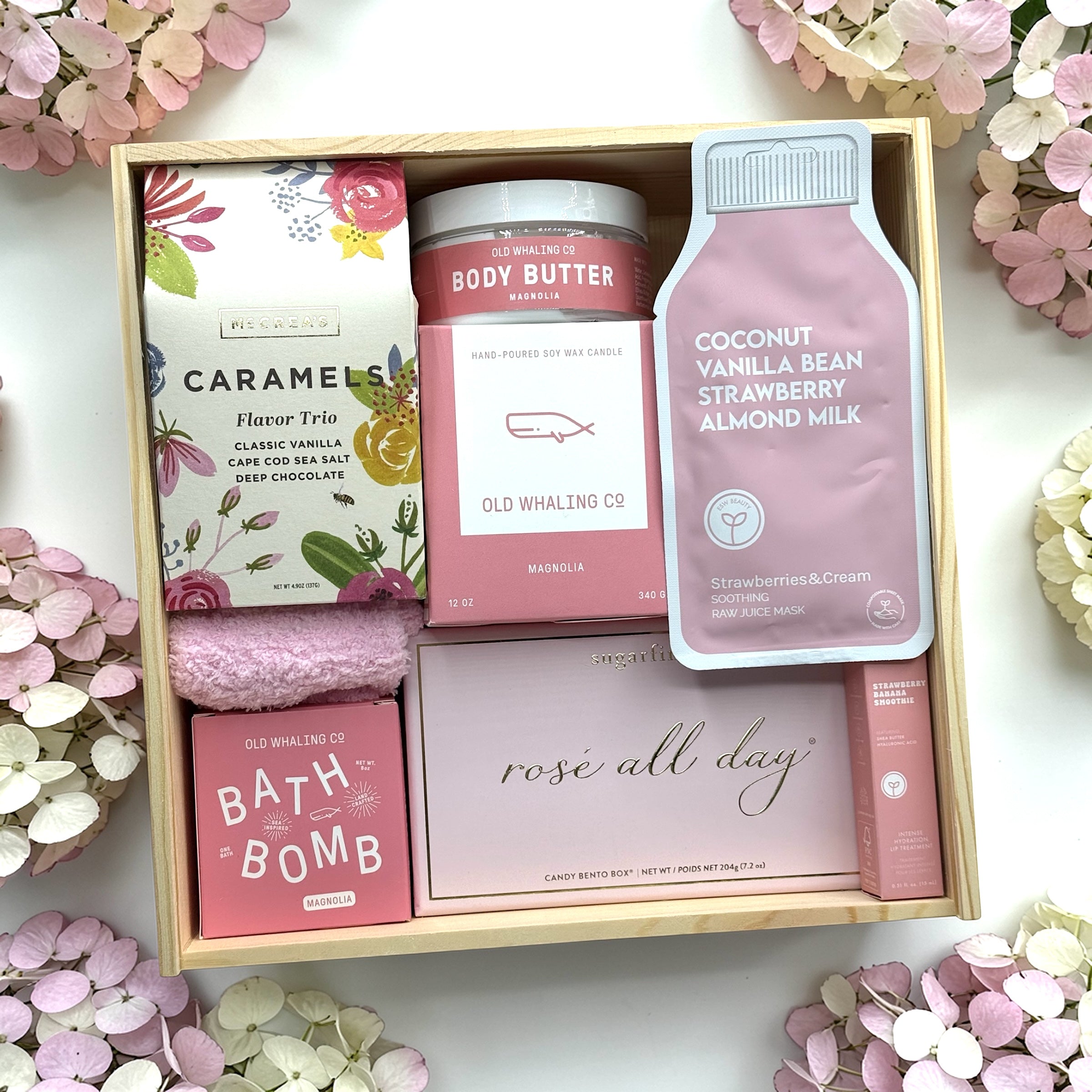 Self care products, rose all day candies, cozy socks and caramels