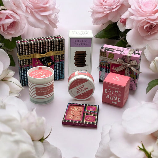 Gourmet gift basket featuring artisan chocolates, fruit jellies, and luxurious magnolia bath products, ideal for special occasions or sending gifts 
