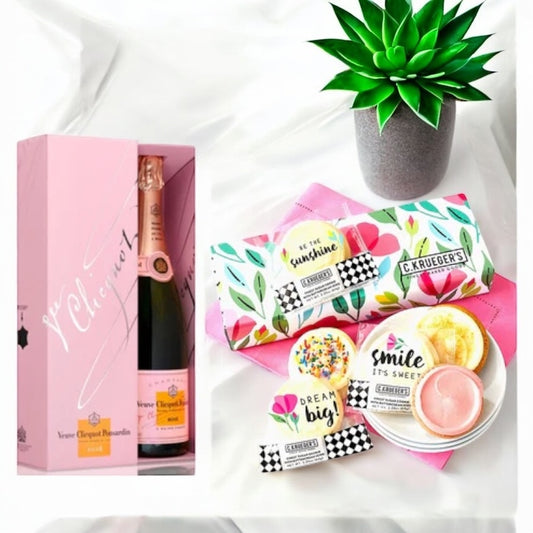 Gift box containing Veuve Rose Champagne and spring cookies.